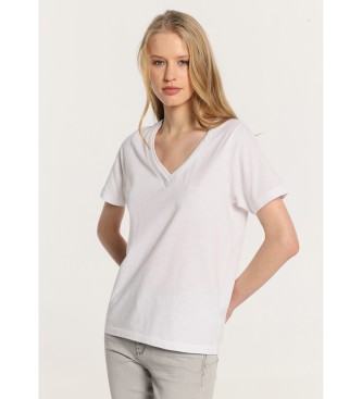 Lois Jeans Kortrmad bas-T-shirt med dubbel V-ringad ribbad krage vit