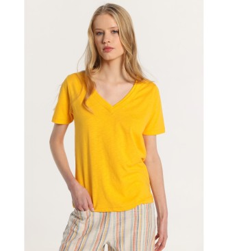 Lois Jeans Kortrmad bas-T-shirt med dubbel V-ringad ribbad krage gul