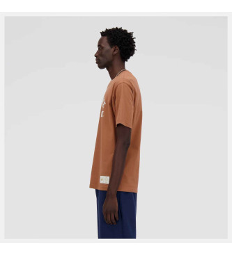 New Balance Sportswear majica Greatest Hits rjave barve