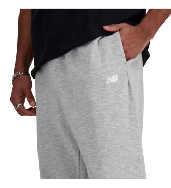 New Balance Pantaloni da jogging Sport Essentials grigi