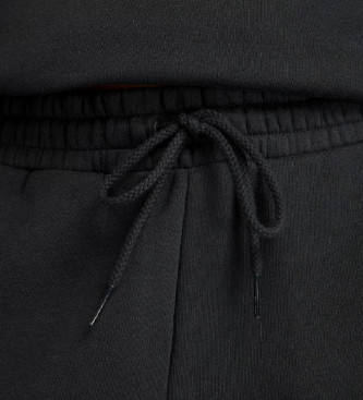 New Balance Pantalon large en polaire rinvent noir