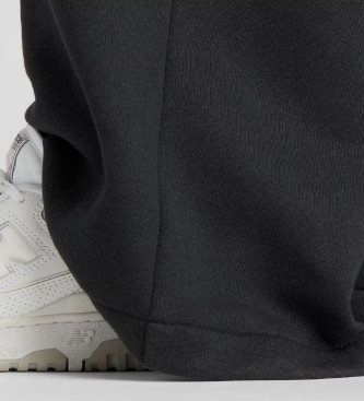 New Balance Pantalon large en polaire rinvent noir