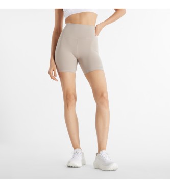 New Balance Harmony hjtaljede shorts 6 taupe