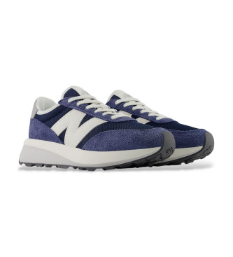 New Balance Usnjene športne copate 370 mornarsko modra