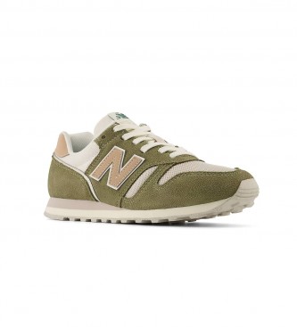 New Balance 373v2 green leather sneakers