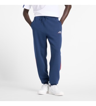 New Balance Pantaloni da jogging classici in pile blu scuro