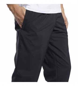 Reebok Pantaloni con risvolto in tessuto Training Essentials neri