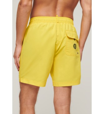 Superdry Swimwear made from yellow recycled material