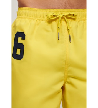 Superdry Swimwear made from yellow recycled material