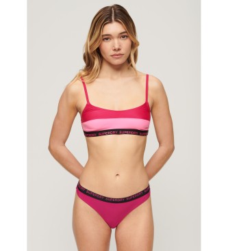 Superdry Stretchy bikini bottoms with a daring cut in pink