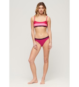 Superdry Stretchy bikini bottoms with a daring cut in pink