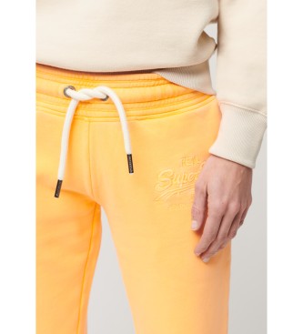 Superdry Rozkloszowane spodnie jogger neonowożółte