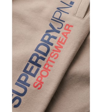 Superdry Spodnie jogger z logo Sportswear brązowe