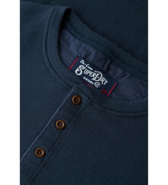 Superdry T-shirt del negozio mercantile della Marina