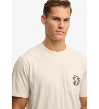 Superdry Merchant Grafična majica z žepi iz belo-rumene barve