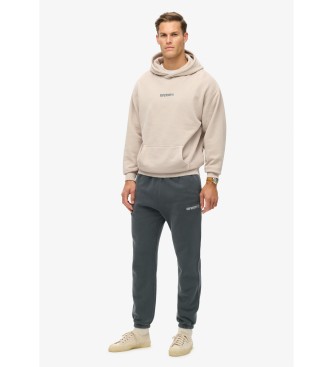 Superdry Spodnie jogger z szarym nadrukiem z mikrologo 