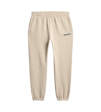 Superdry Spodnie jogger z beżowym nadrukiem z mikrologo