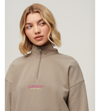 Superdry Sportswear pulover z zadrgo v bež barvi