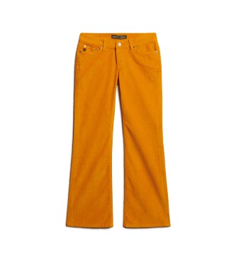 Superdry Pomarańczowe sztruksowe dżinsy z niskim stanem i rozkloszowanym dołem
