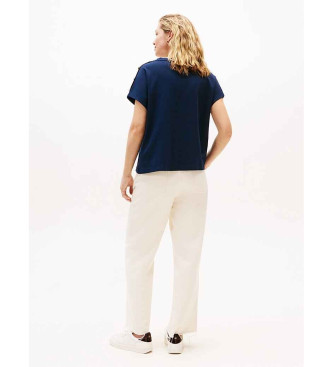 Tommy Hilfiger T-shirt with gold buttons on the navy shoulder