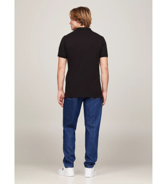 Tommy Jeans Puur katoenen polo in zwart slim fit