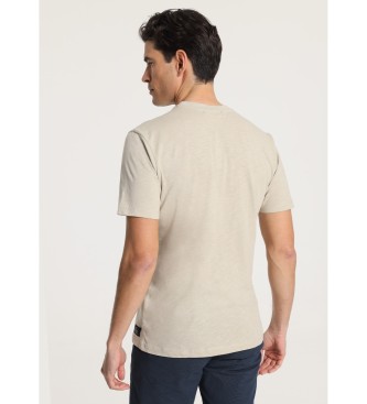 Victorio & Lucchino, V&L T-shirt met korte mouwen en cirkelvormig patroon op de borst