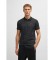 Acheter BOSS Polo en coton avec jacquard circulaire en noir