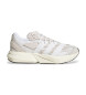 adidas Lichtblauwe beige sportschoenen