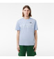 Lacoste T-shirt med kontrastfärgat tryck och blått märke