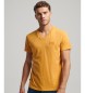 Superdry T-shirt Essential in cotone biologico con scollo a V gialla