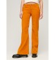 Superdry Jeans arancioni in velluto a coste svasati a vita bassa
